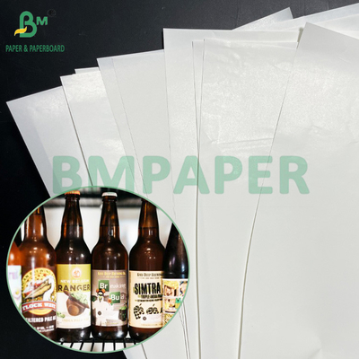 65 gm 70 gm résistant à l'eau résistance à l'humidité C1S papier d'étiquette pour autocollant de bouteille de bière