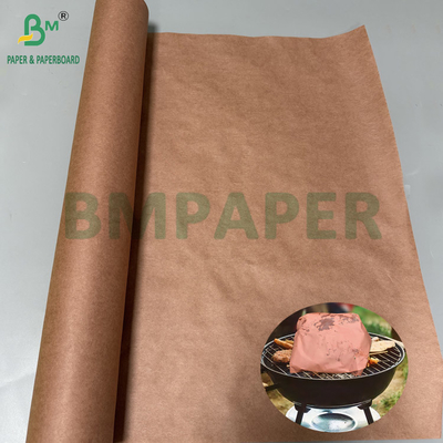 Un rouleau de papier rose pour emballer de la viande 70 g 60 g 24 pouces par 175 pieds
